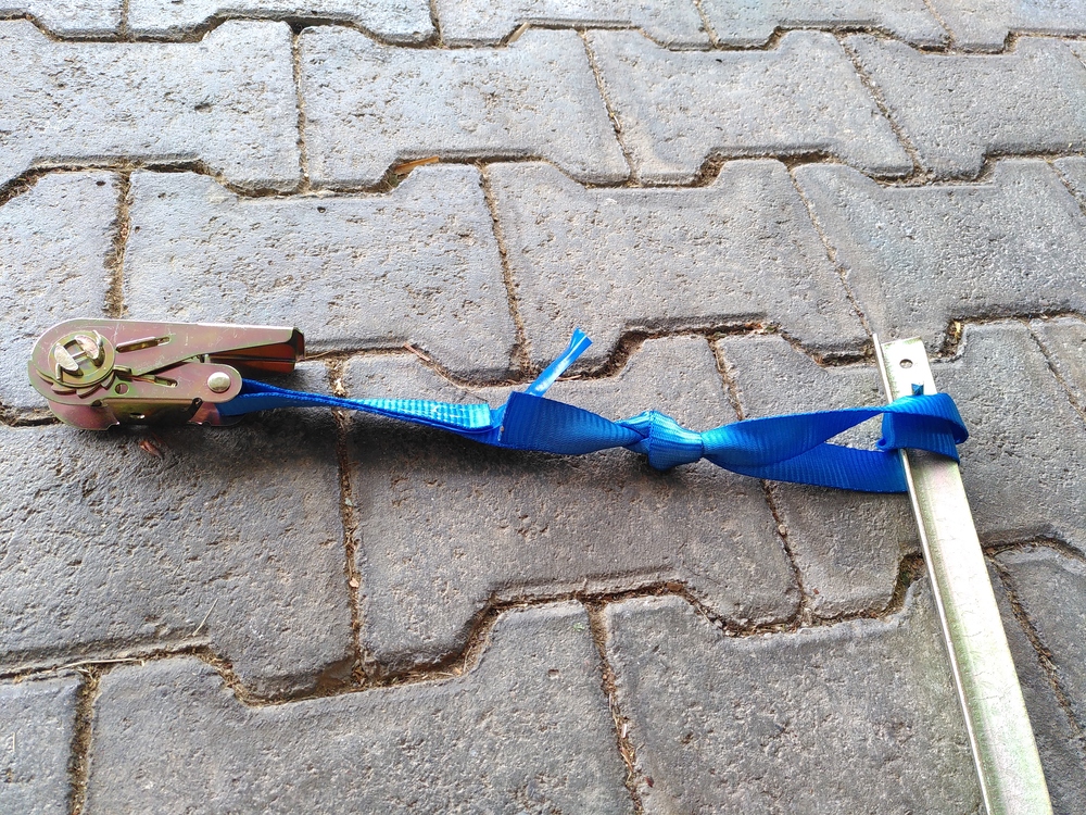 a 30cm long T-shaped steel tent peg